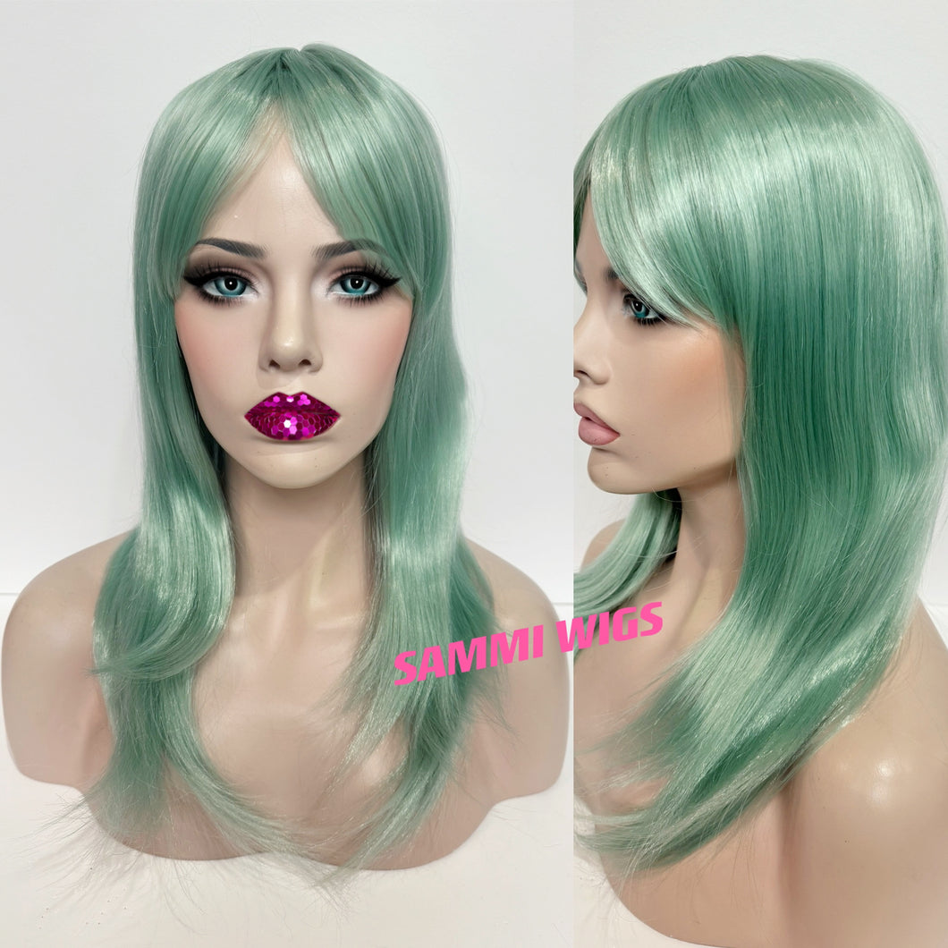 F730 Medium long wig in light green color