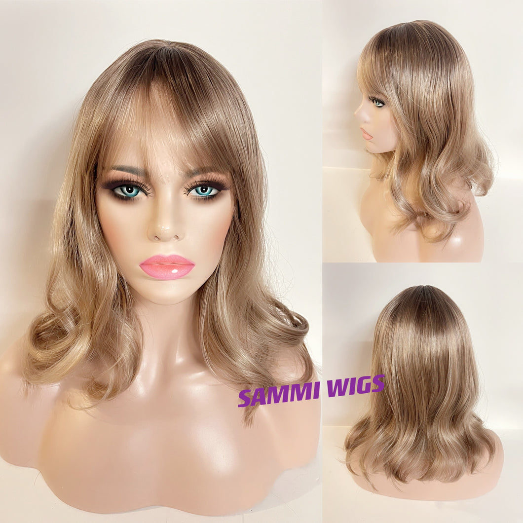 Shoulder length curly dark blond wig