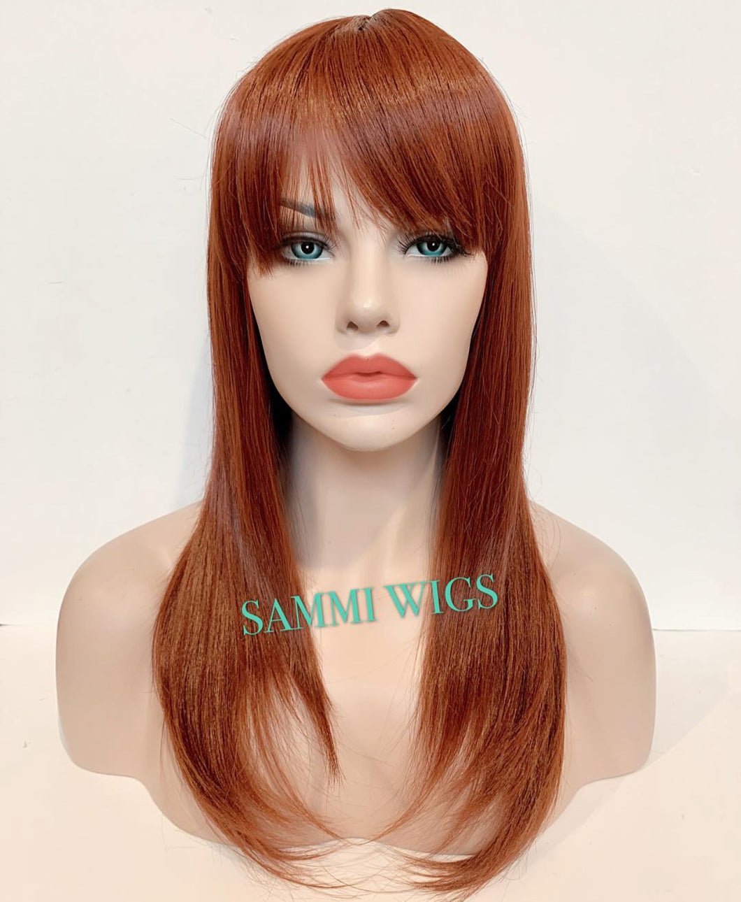 F730 35 Medium length wig in dark orange color