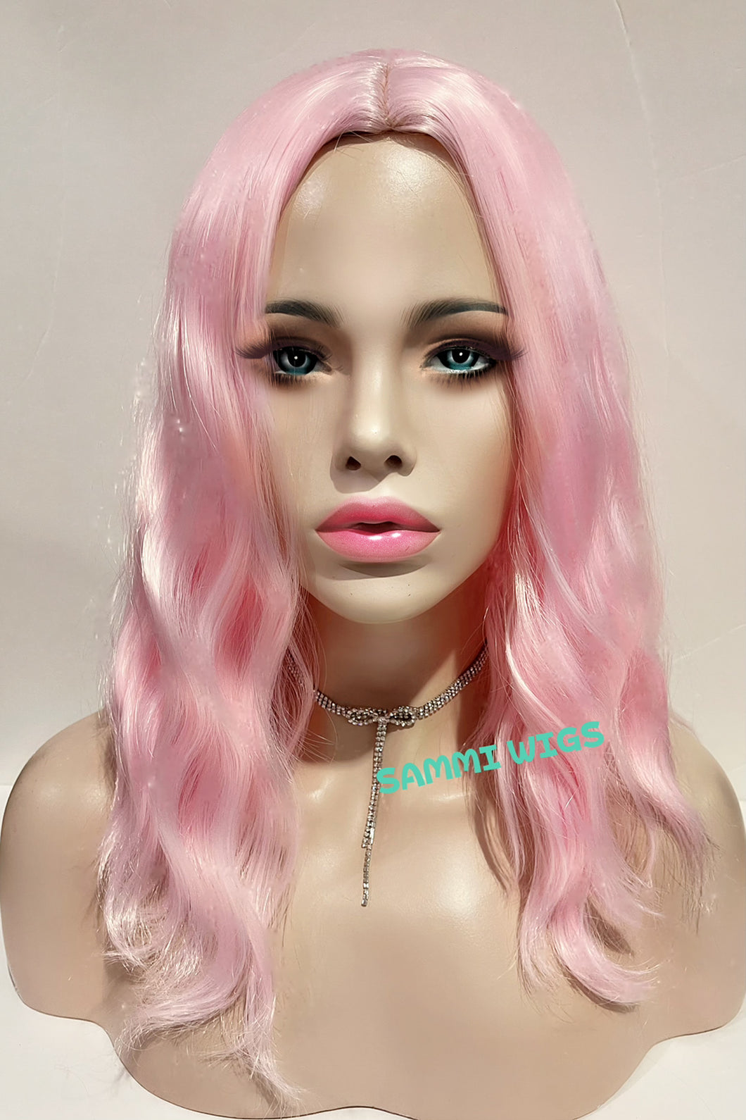 Short pink in loose curly wig